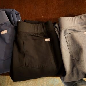 3 pairs Figs scrubs, size large. Brand new